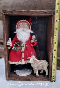 Primitive Santa  in a Antique Wooden Box