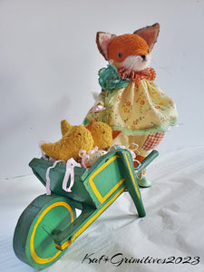 Momma Matilda Fox and a wagon of cHicks